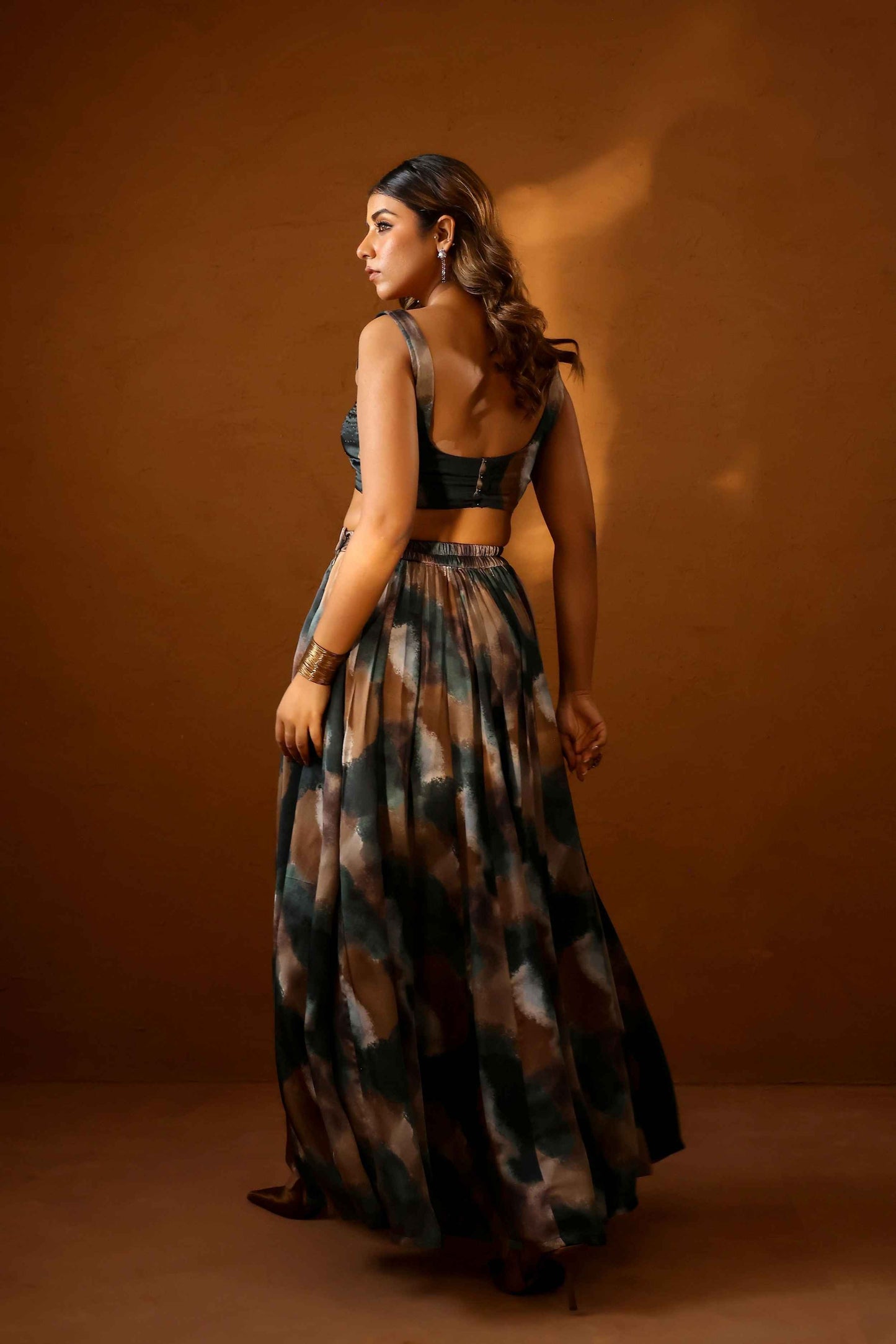 Heena Somani in Patina skirt paired with bustier and jacket