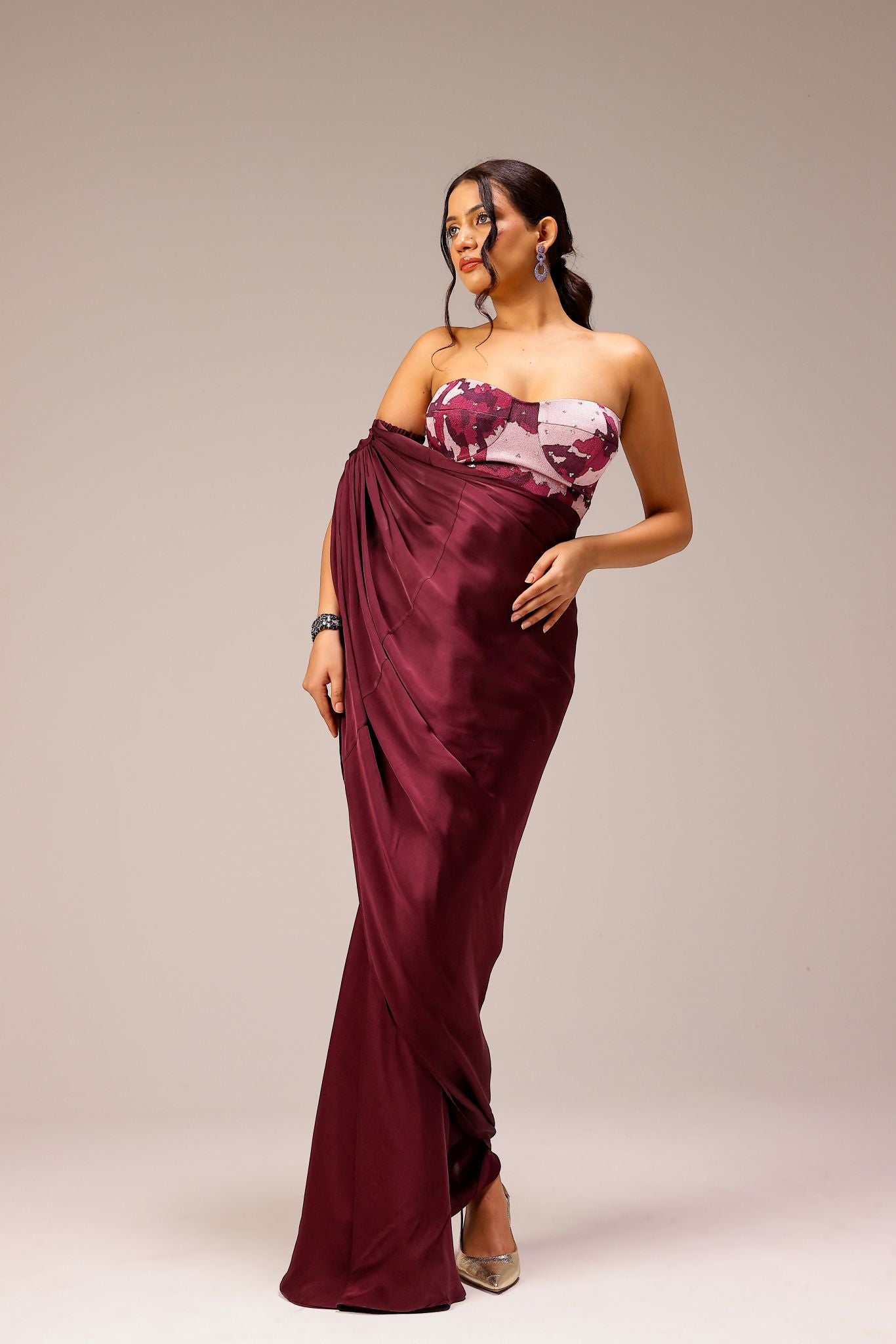 Wine Draped Saree Paired With Hand Embellished Blouse