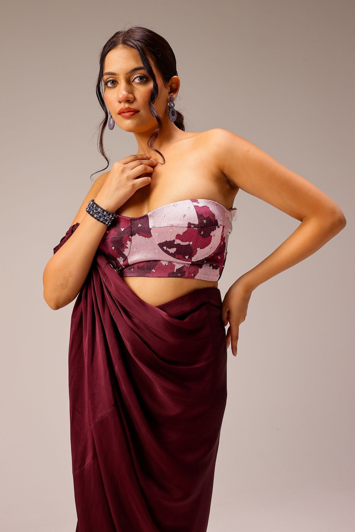 Wine Draped Saree Paired With Hand Embellished Blouse
