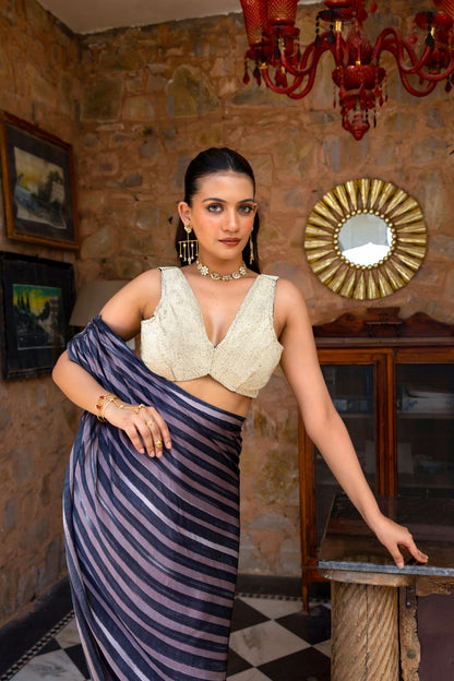 Fiza draped saree paired with a blouse