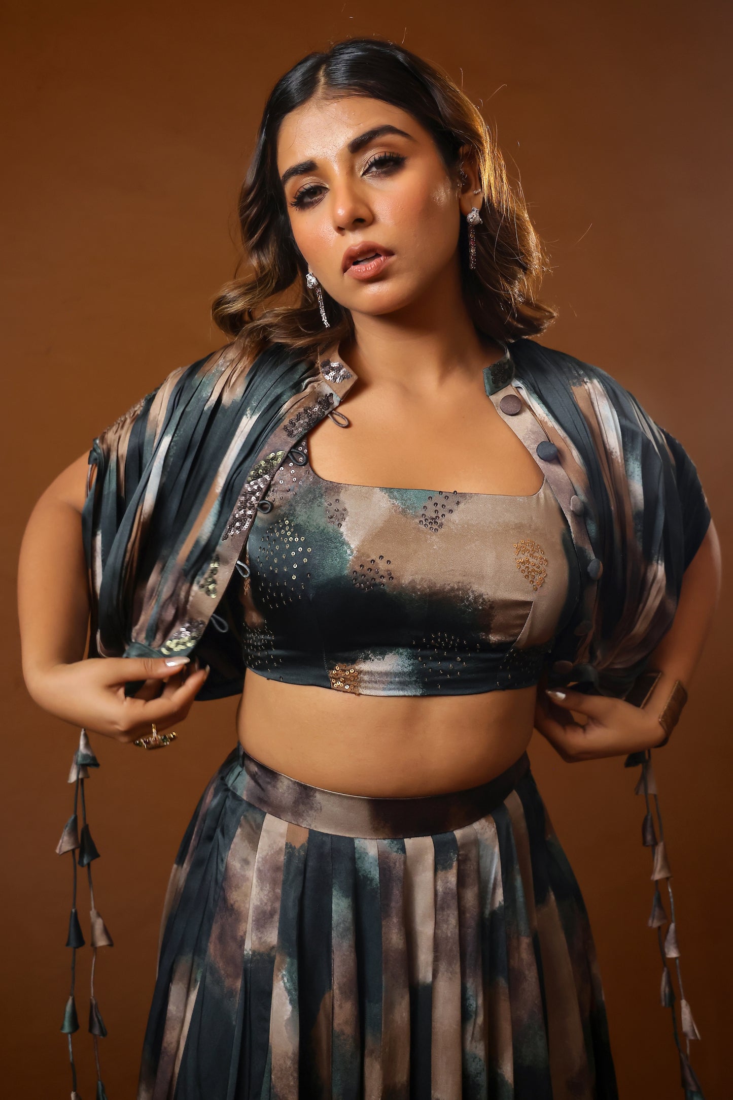 Patina skirt paired with bustier and jacket