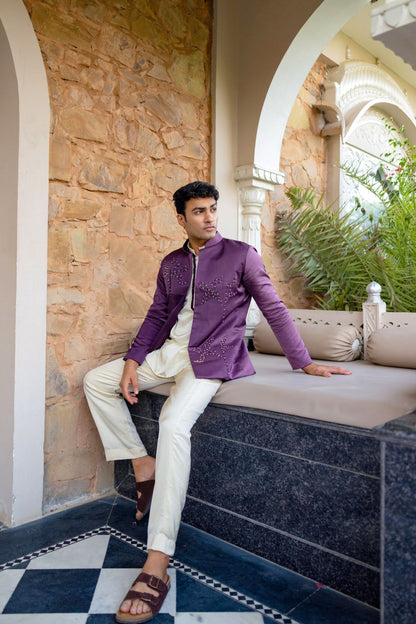 Off-white kurta set paired with embellished jacket