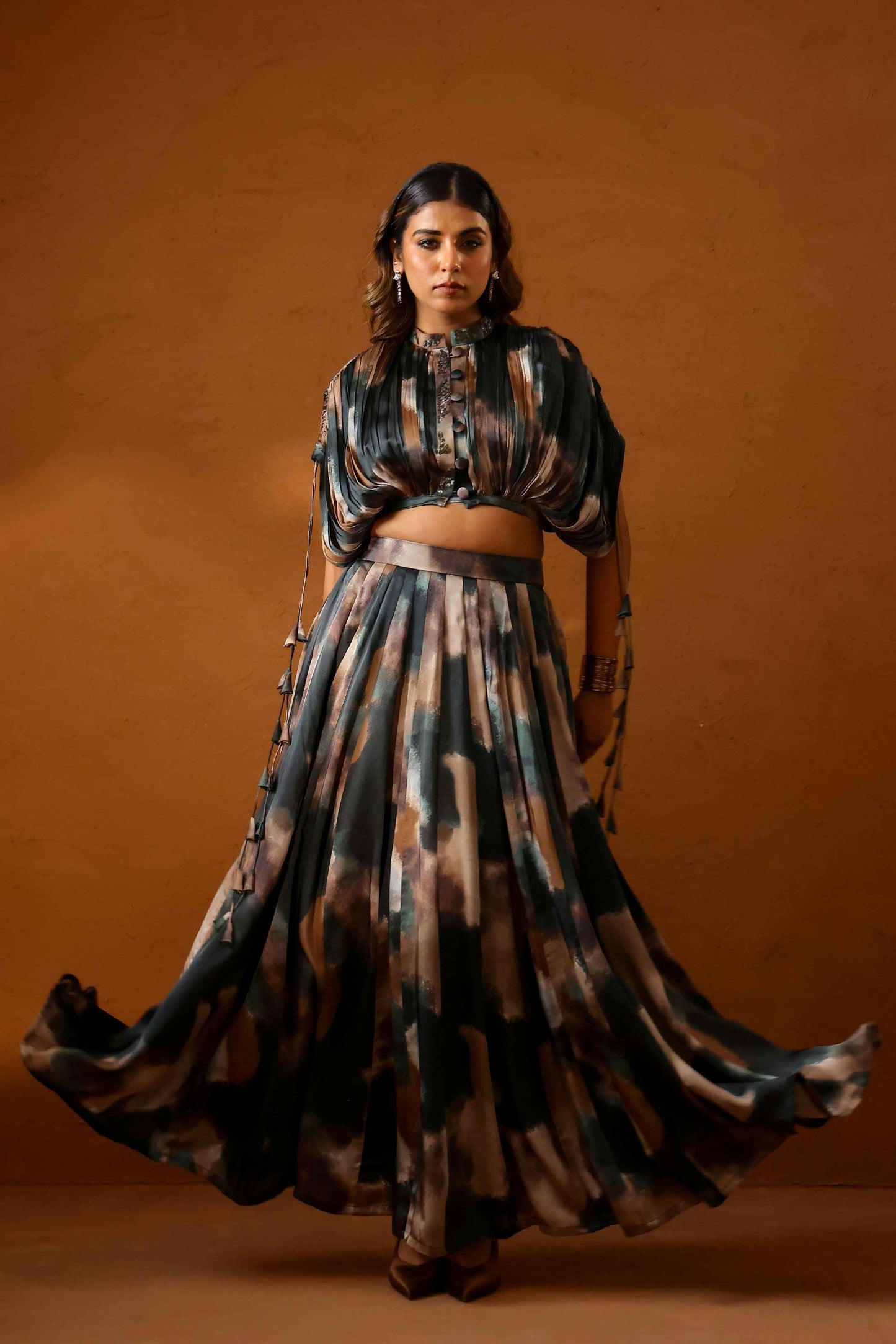 Heena Somani in Patina skirt paired with bustier and jacket