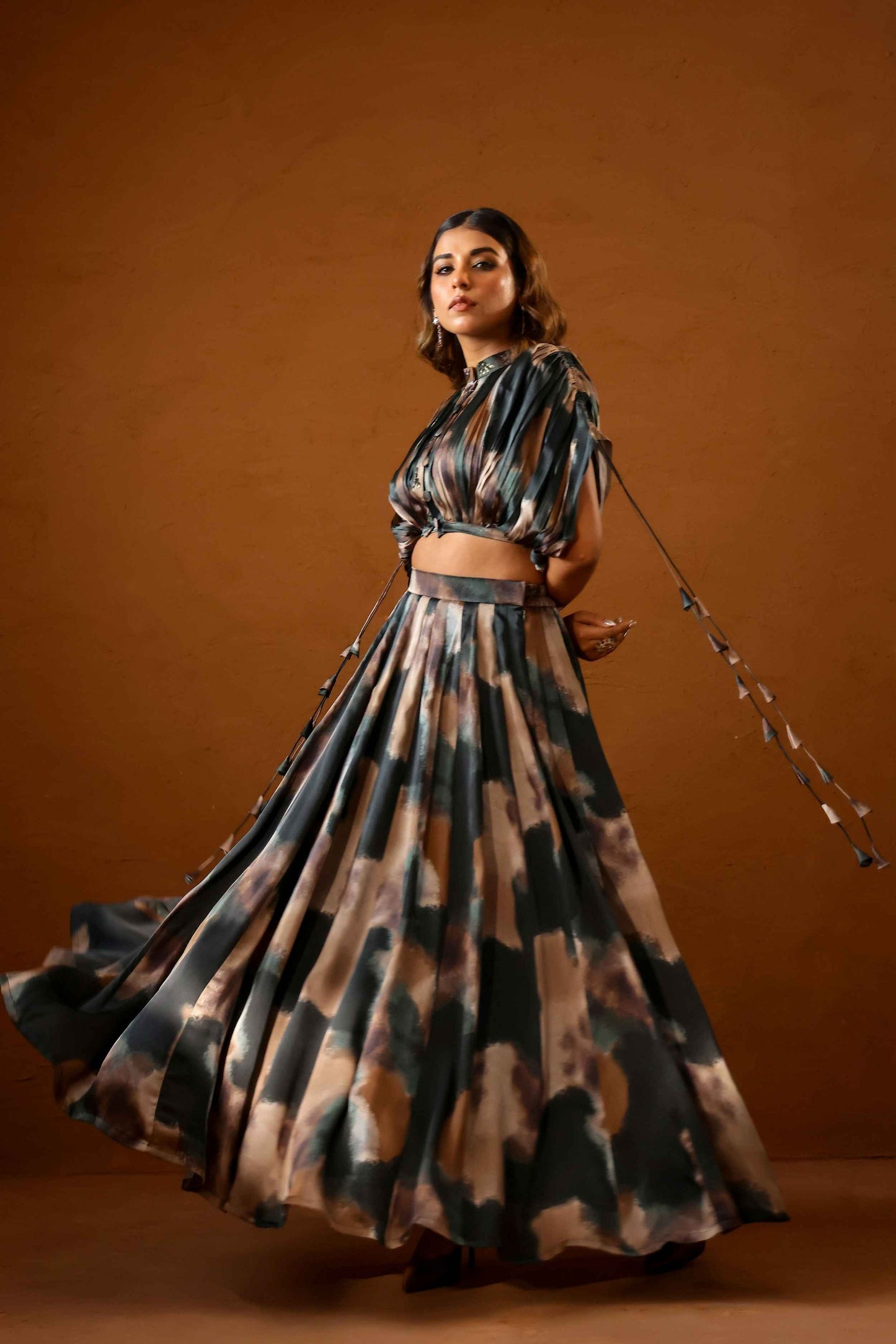 Heena Somani in Patina skirt paired with bustier and jacket